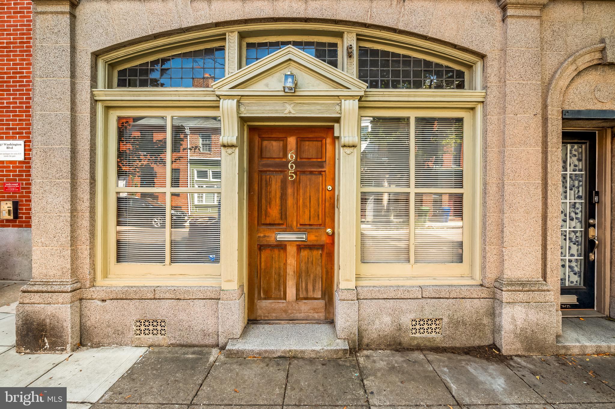 665 Washington Boulevard Baltimore, MD 21230 - Photo 1 of 21 a front view of a house with a outdoor space