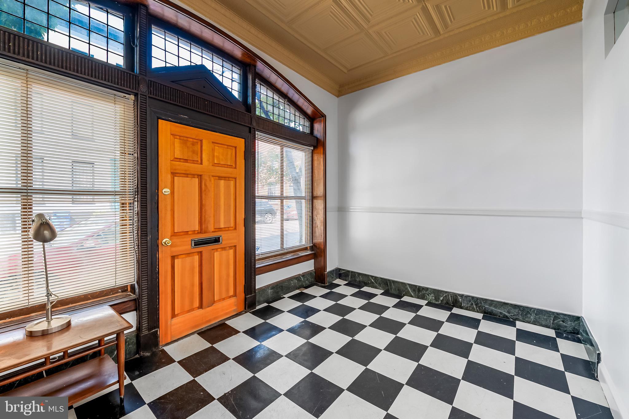 665 Washington Boulevard Baltimore, MD 21230 - Photo 3 of 21 a view of a room with a black and white checkered floor