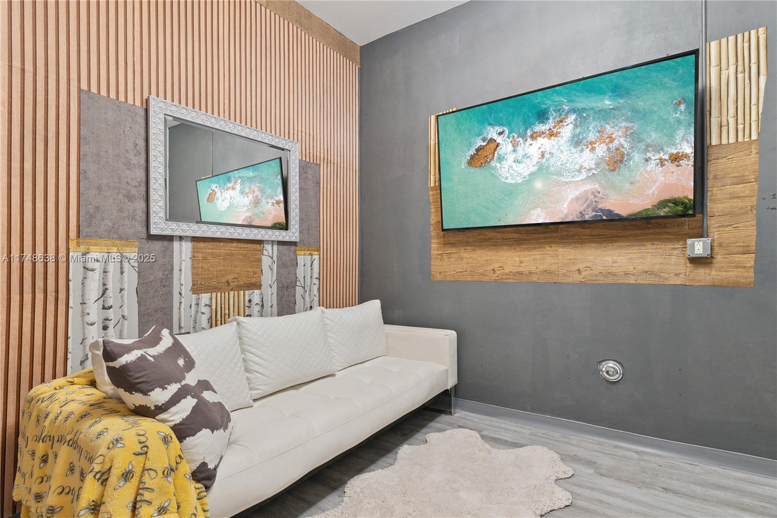 3575 Southwest 23rd Street, Unit 3575 Miami, FL 33145 - Photo 3 of 20 a living room with furniture and a flat screen tv