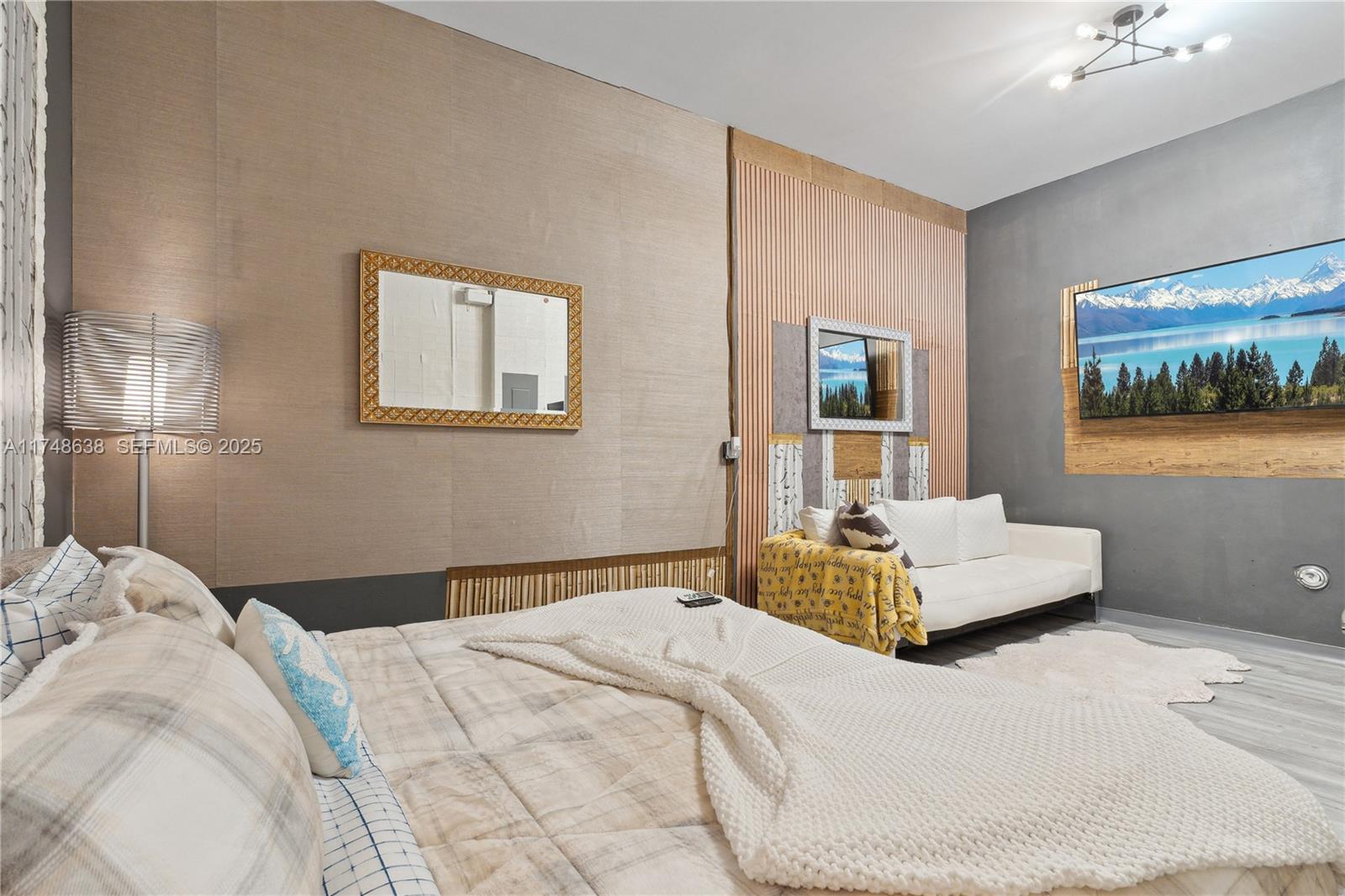 3575 Southwest 23rd Street, Unit 3575 Miami, FL 33145 - Photo 10 of 20 a bedroom with a bed and a couch