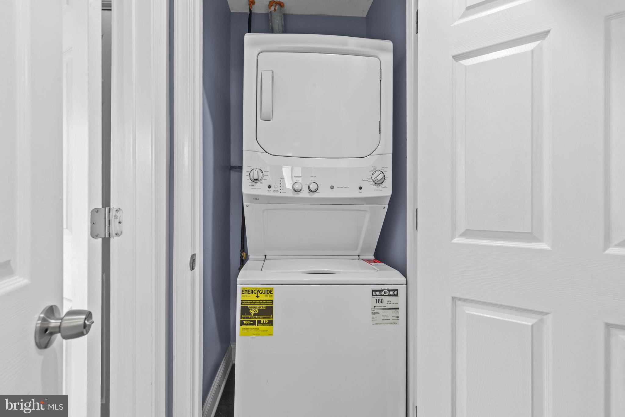 7602 Oxman Road Landover, MD 20785 - Photo 12 of 17 a utility room with dryer and washer