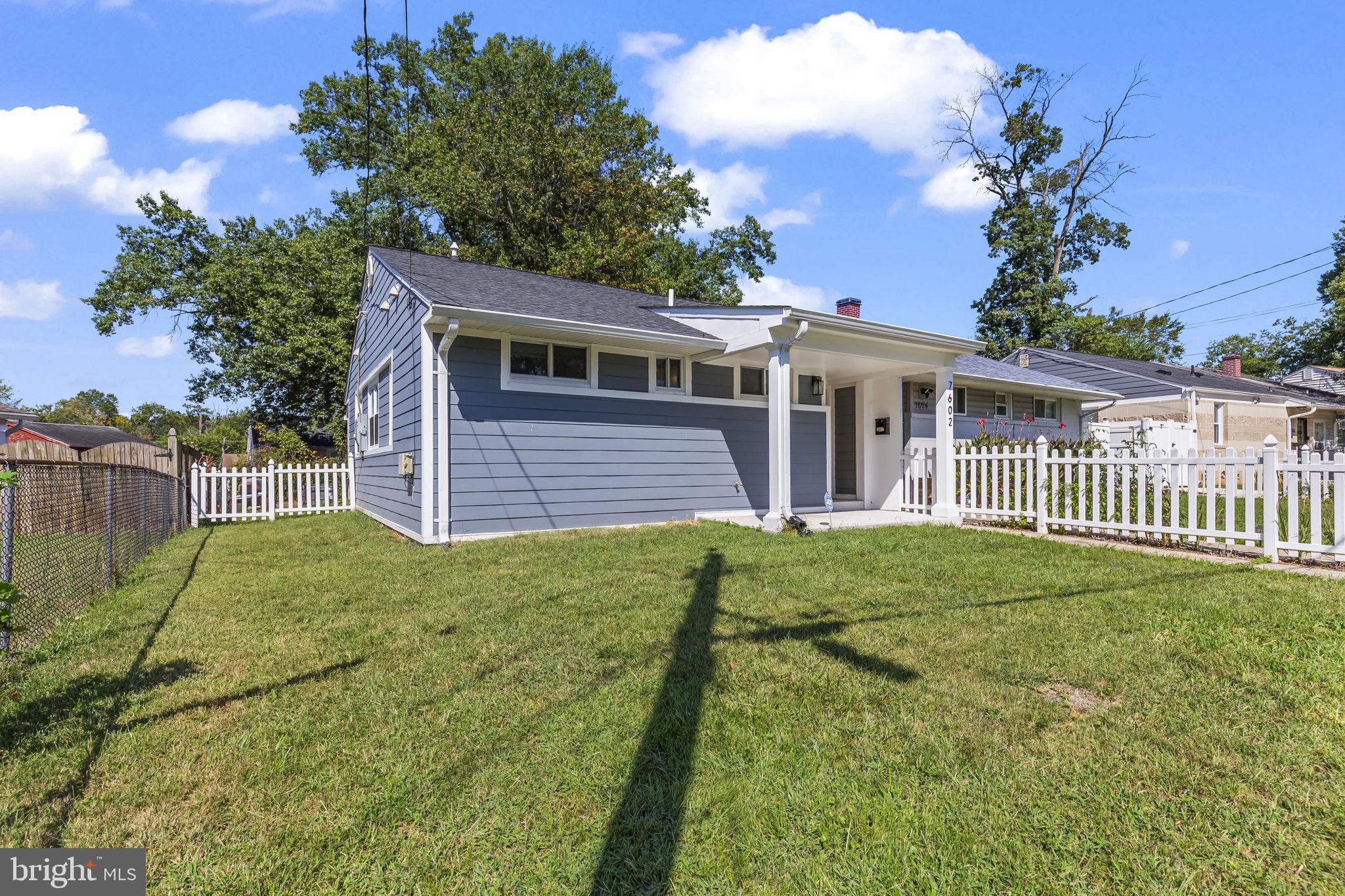 7602 Oxman Road Landover, MD 20785 - Photo 17 of 17 a view of a house with backyard and a garden