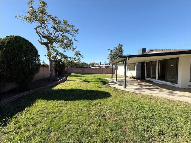 a view of a house with swimming pool