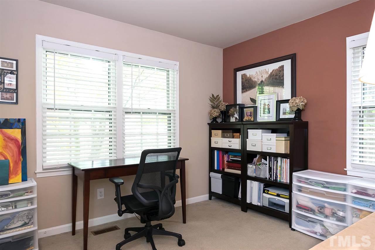 7713 Prospector Place Raleigh, NC 27615 - Photo 8 of 18 a view of a workspace with a window and workspace