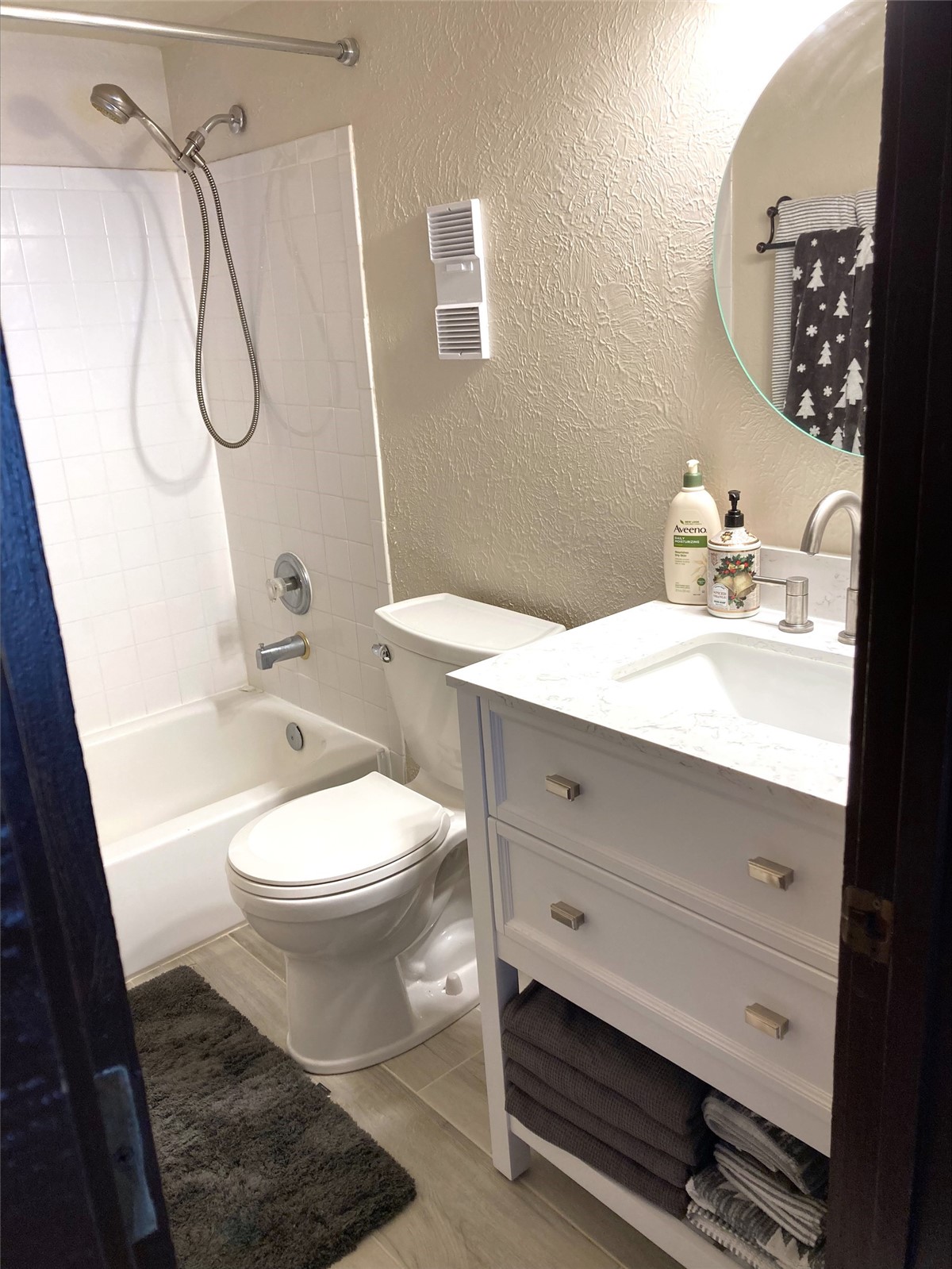 8500 Ryan Gulch Road, Unit 301 Silverthorne, CO 80498 - Photo 14 of 49 a bathroom with a sink a toilet and shower