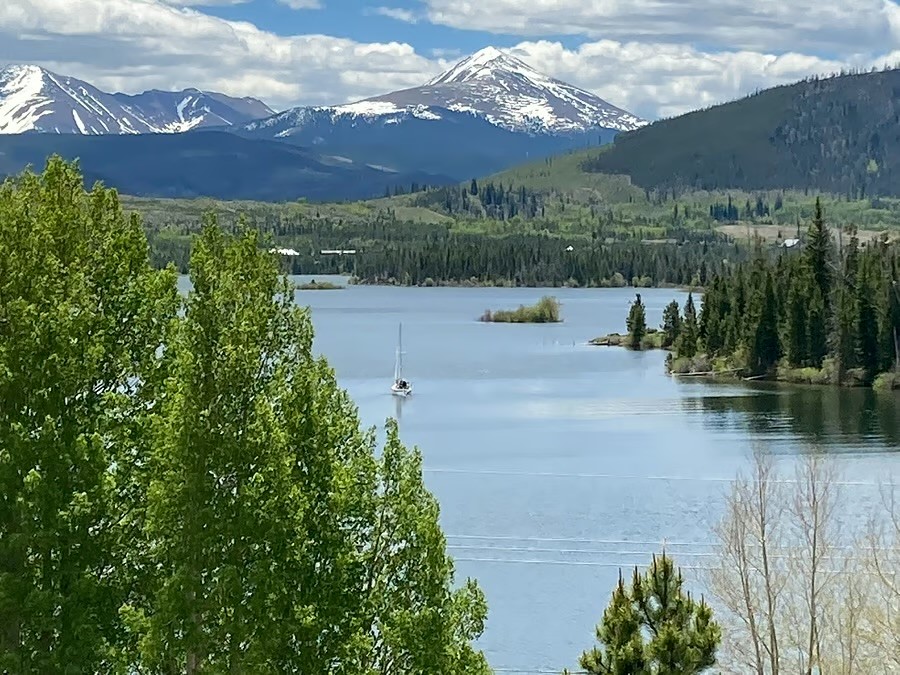 8500 Ryan Gulch Road, Unit 301 Silverthorne, CO 80498 - Photo 47 of 49 a view of a lake with a mountain in the background