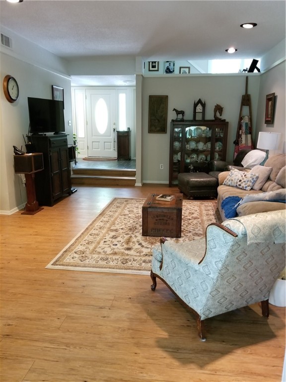 2011 Shelter Point Anderson, SC 29626 - Photo 6 of 33 Large living room with laminate wood floors