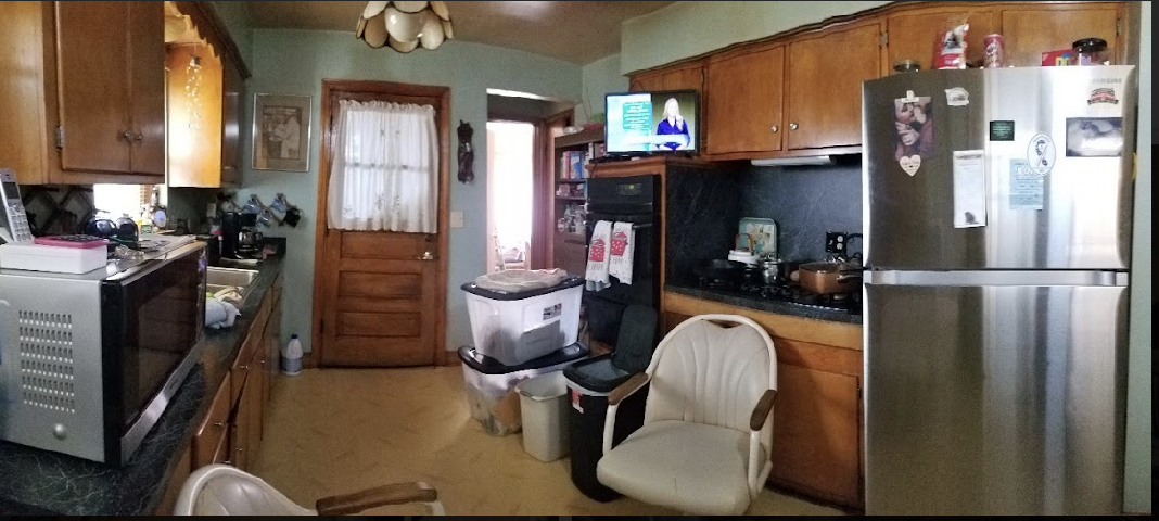 Undisclosed Address Chicago, IL 60625 - Photo 3 of 6 a kitchen with refrigerator a washer and dryer