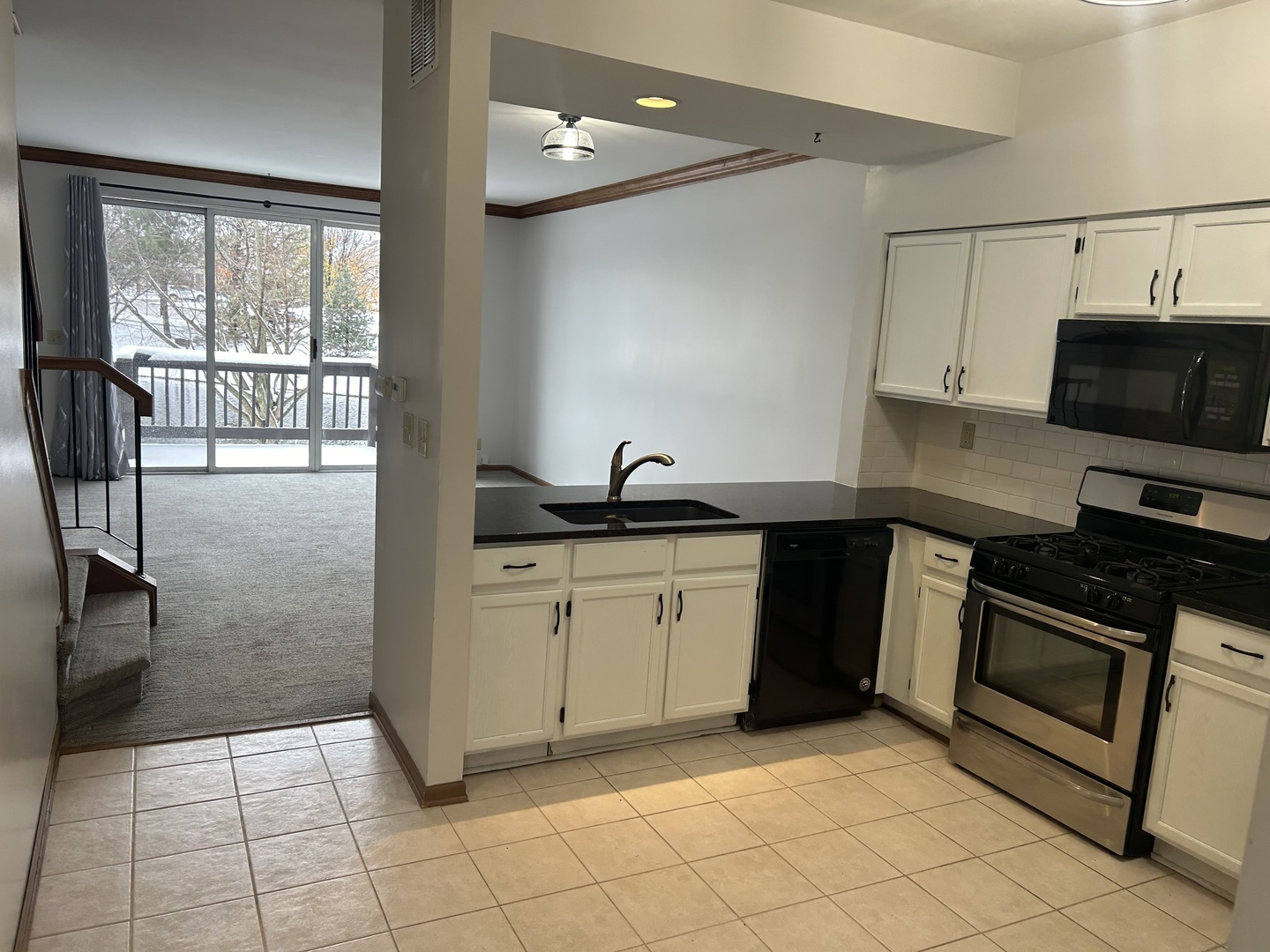 1846 Lucylle Court St. Charles, IL 60174 - Photo 2 of 15 a kitchen with stainless steel appliances granite countertop a stove a sink and a microwave