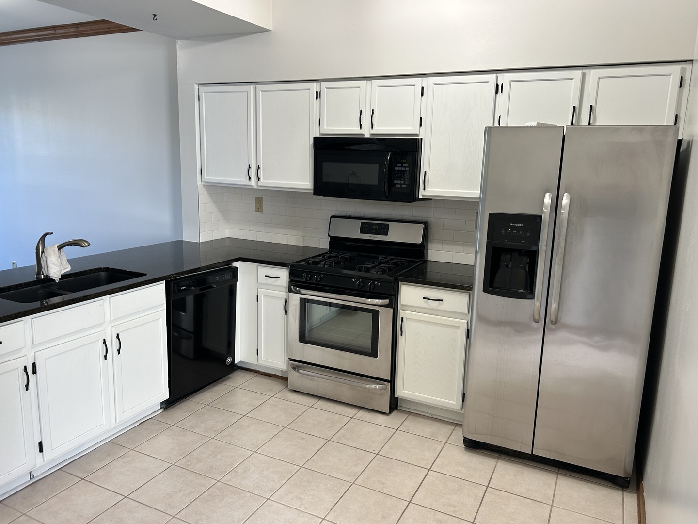 1846 Lucylle Court St. Charles, IL 60174 - Photo 3 of 15 a kitchen with cabinets and steel stainless steel appliances