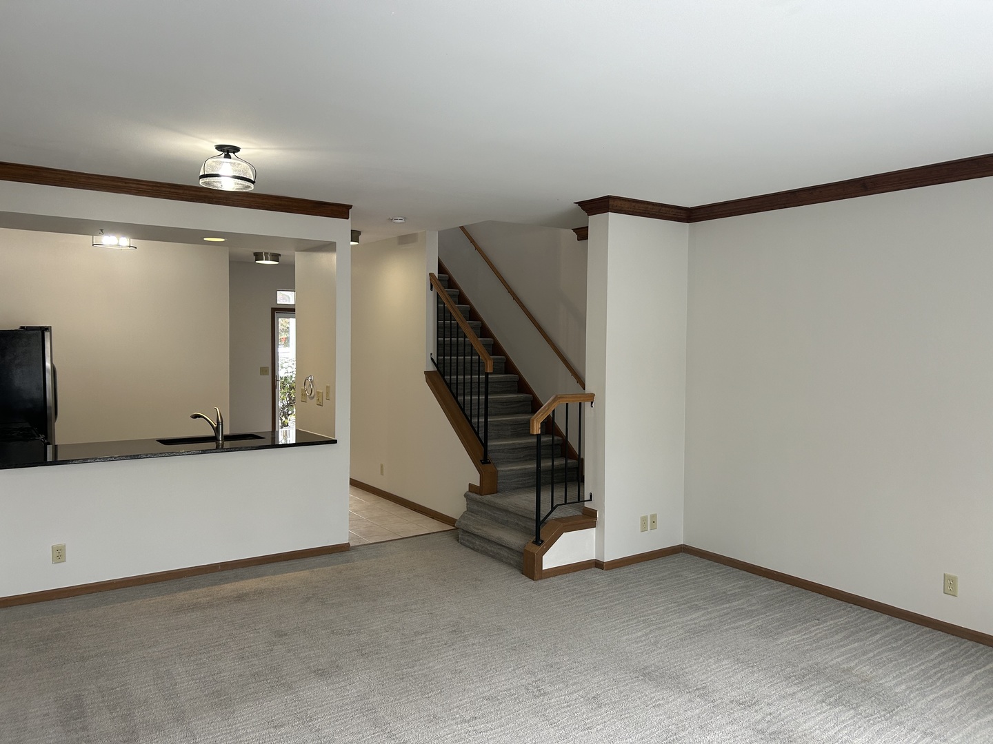 1846 Lucylle Court St. Charles, IL 60174 - Photo 6 of 15 an empty room with staircase and white walls