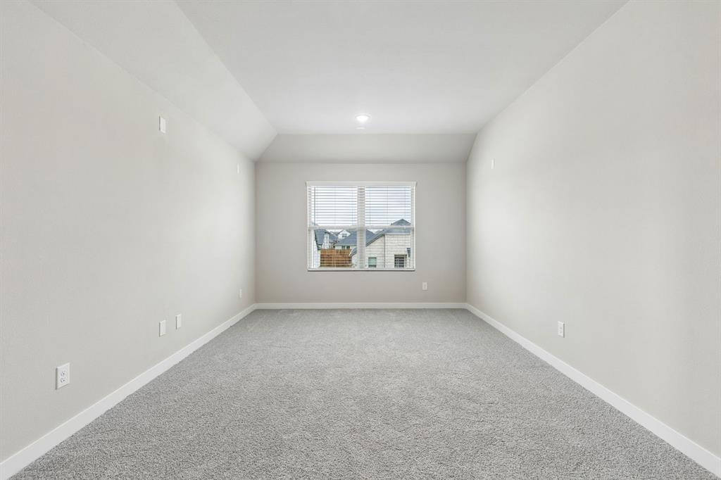 1121 Del Rio Drive Lavon, TX 75166 - Photo 19 of 32 an empty room with entrance and windows