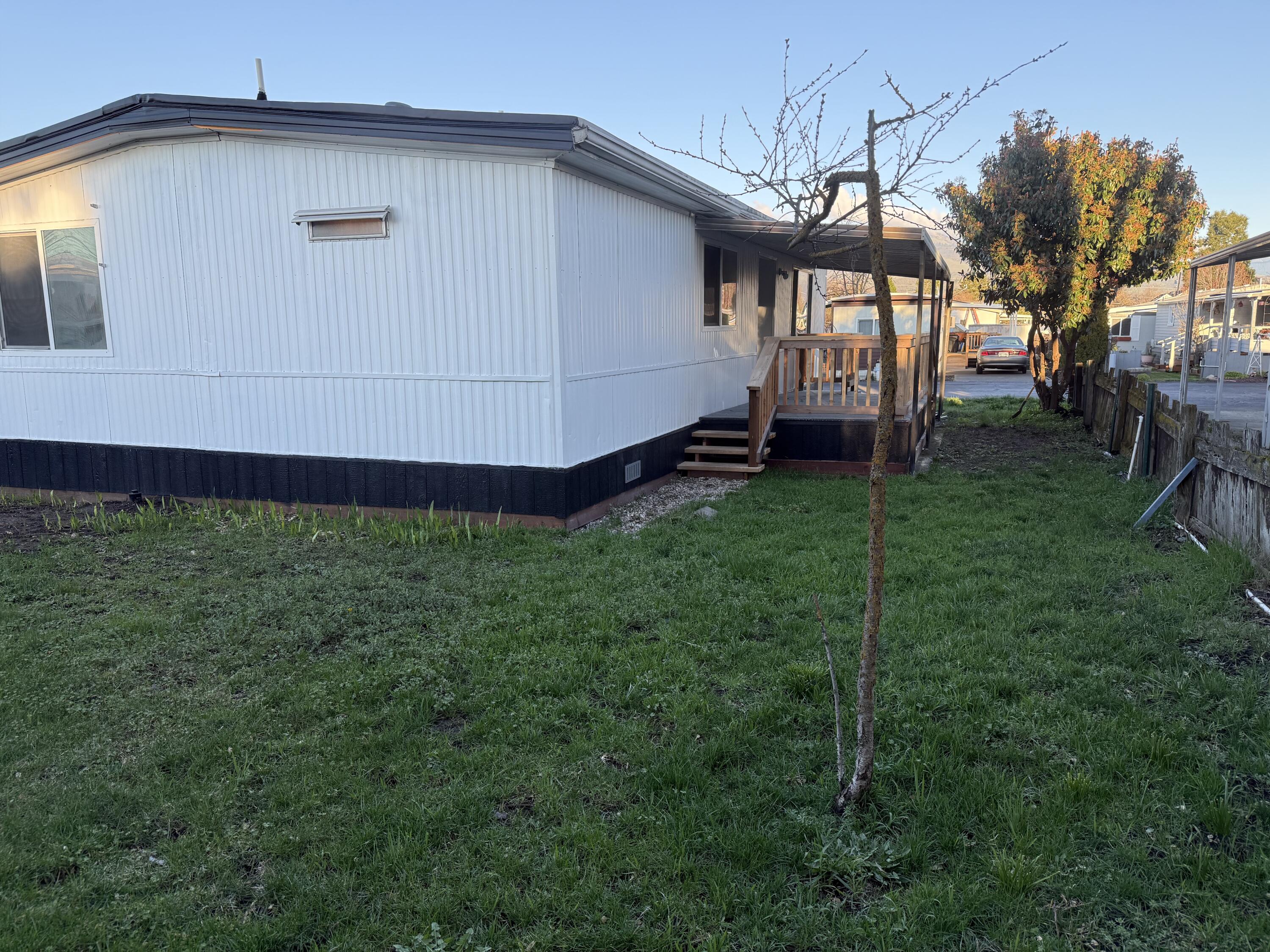 355 Colver Road, Unit 48 Talent, OR 97540 - Photo 12 of 30 a backyard of a house with lots of green space