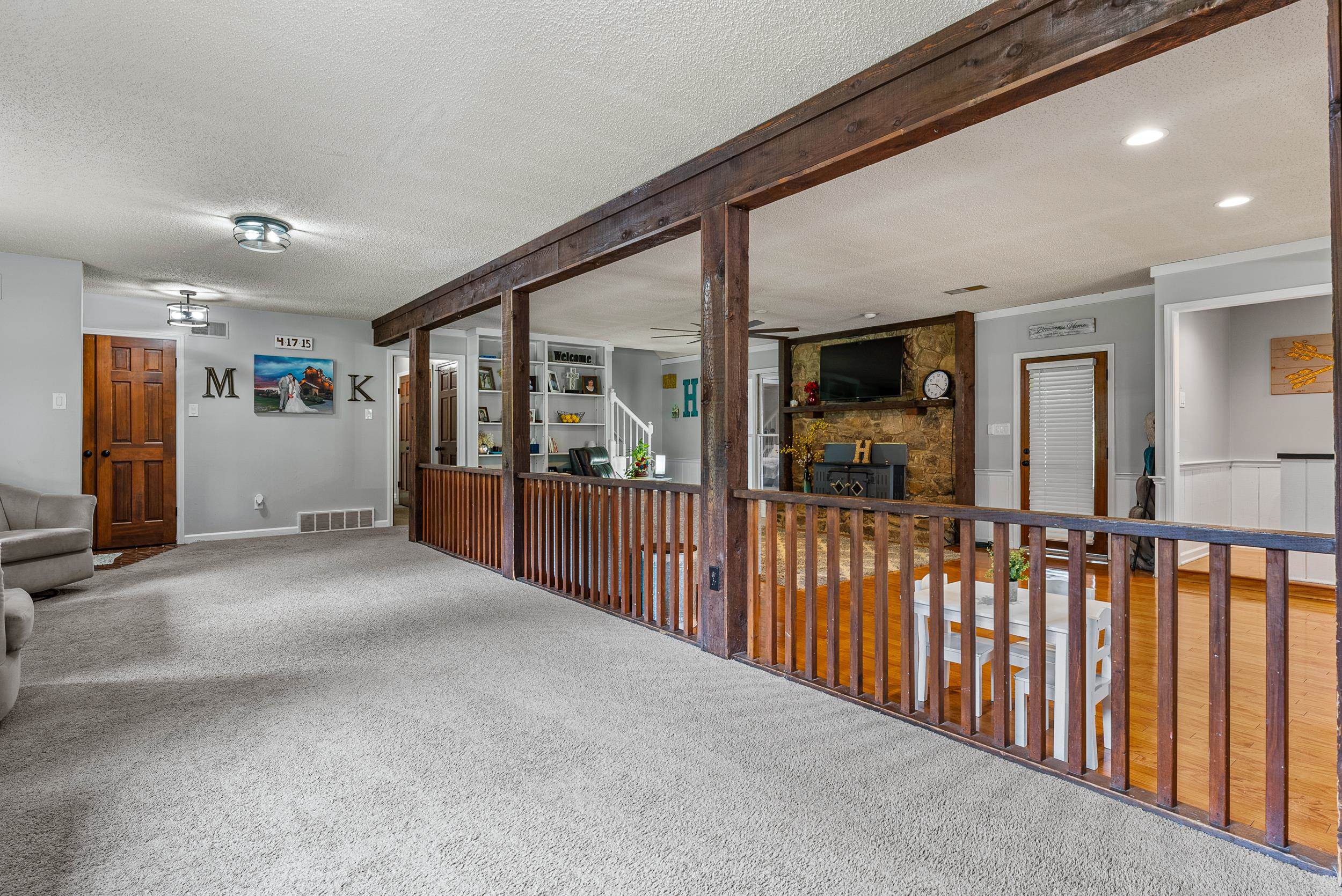 12389 Macon Road Collierville, TN 38017 - Photo 20 of 37 Interior space featuring beam ceiling, a textured ceiling, and carpet floors