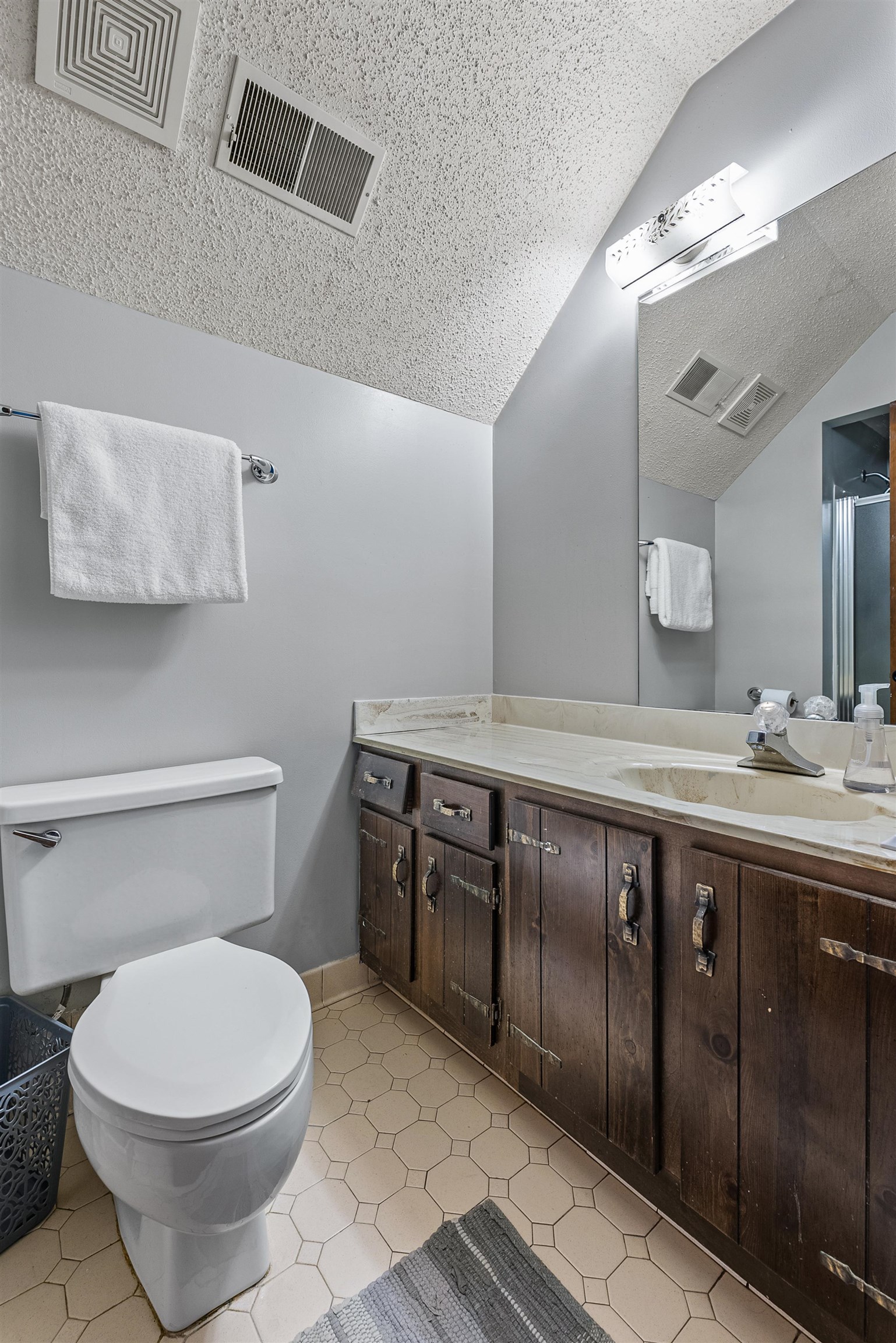 12389 Macon Road Collierville, TN 38017 - Photo 36 of 37 Bathroom featuring tile patterned floors, vanity, and toilet