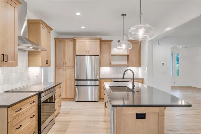 a view of a kitchen from the windows
