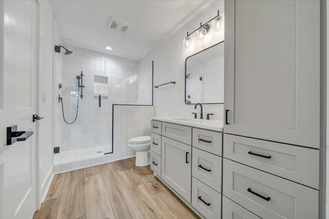 an aerial view of houses with outdoor space