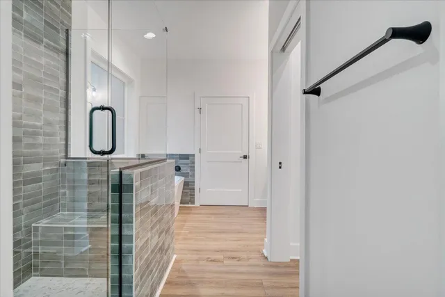 an aerial view of a house with a swimming pool