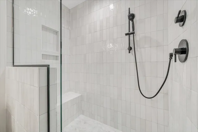 a view of a swimming pool with a lounge chairs