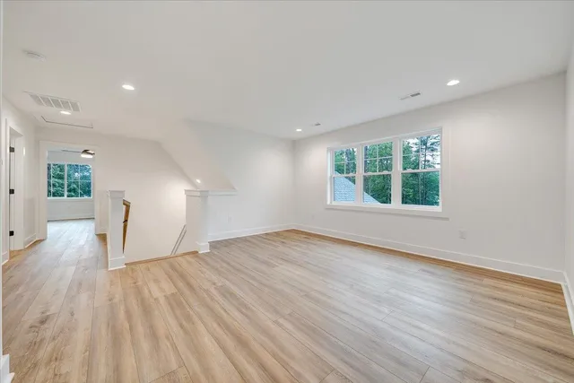 a view of a yard with swimming pool and sitting area