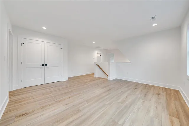 a view of a park with large trees