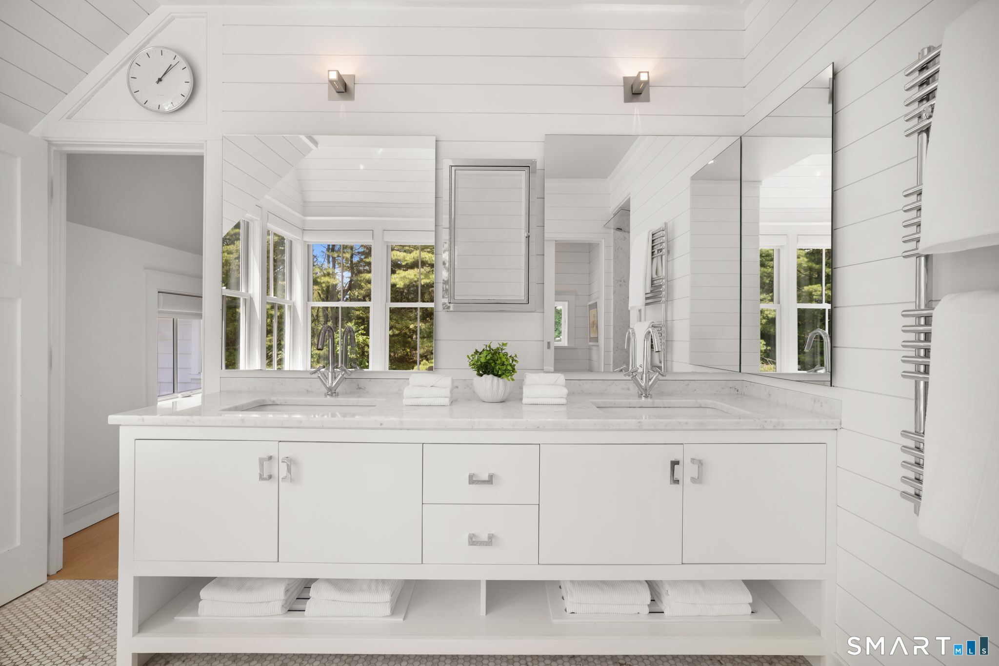 5 West Branch Road Weston, CT 06883 - Photo 25 of 40 a bathroom with a sink and a mirror