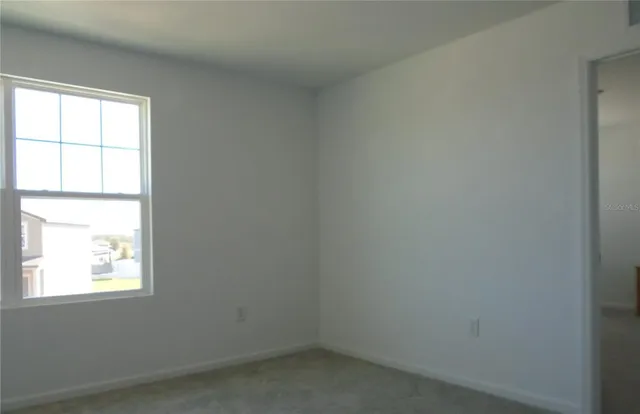 an empty room with a window