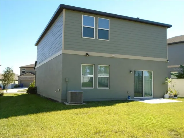 a house view with a outdoor space