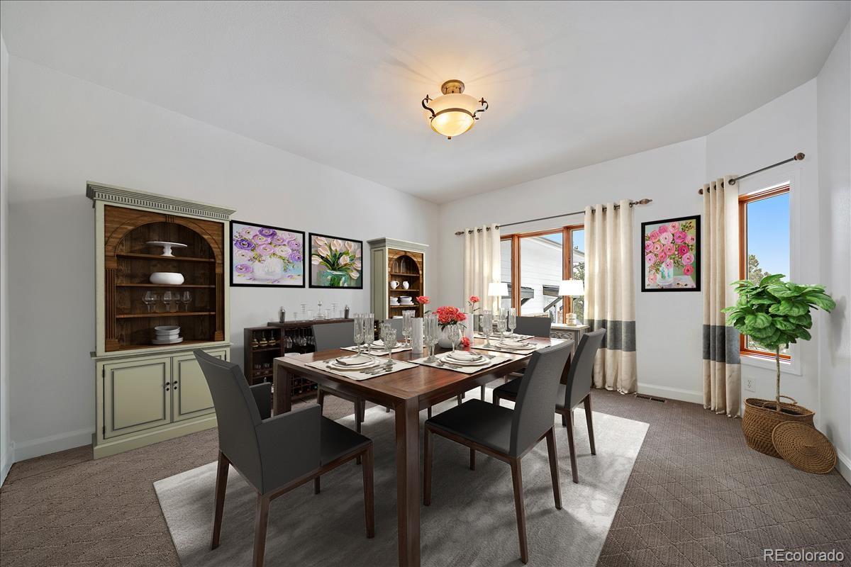 1305 South Grapevine Road Golden, CO 80401 - Photo 11 of 39 a view of a dining room with furniture and window