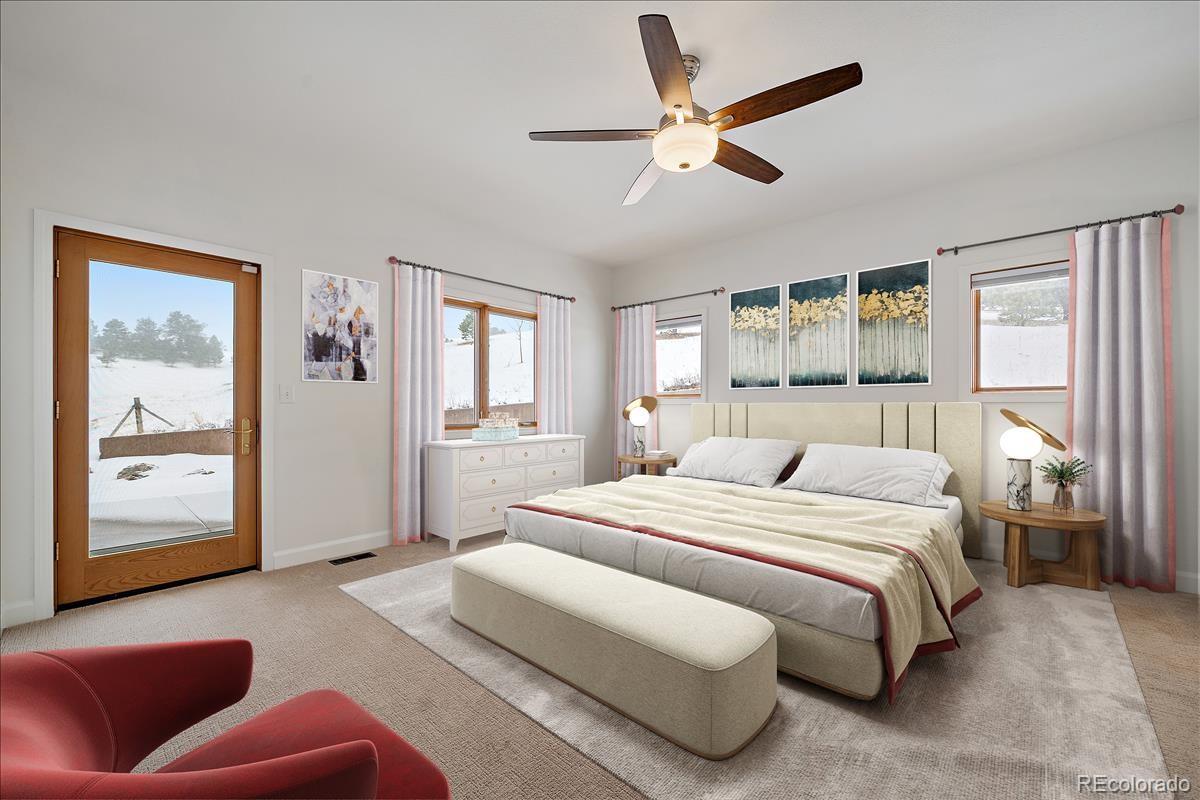 1305 South Grapevine Road Golden, CO 80401 - Photo 13 of 39 a bedroom with a large bed couch and window