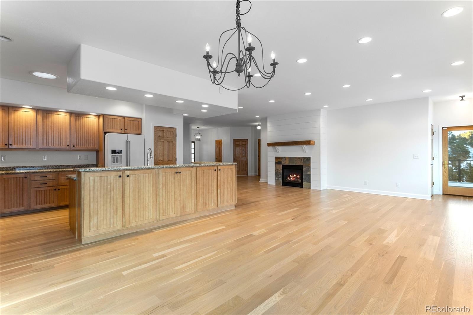 1305 South Grapevine Road Golden, CO 80401 - Photo 15 of 39 a view of a kitchen with a sink and a kitchen counter top