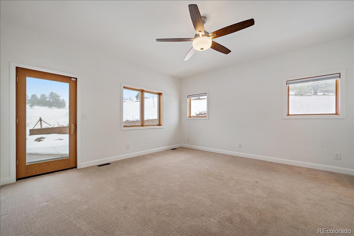 1305 South Grapevine Road Golden, CO 80401 - Photo 26 of 39 a view of an empty room with a window