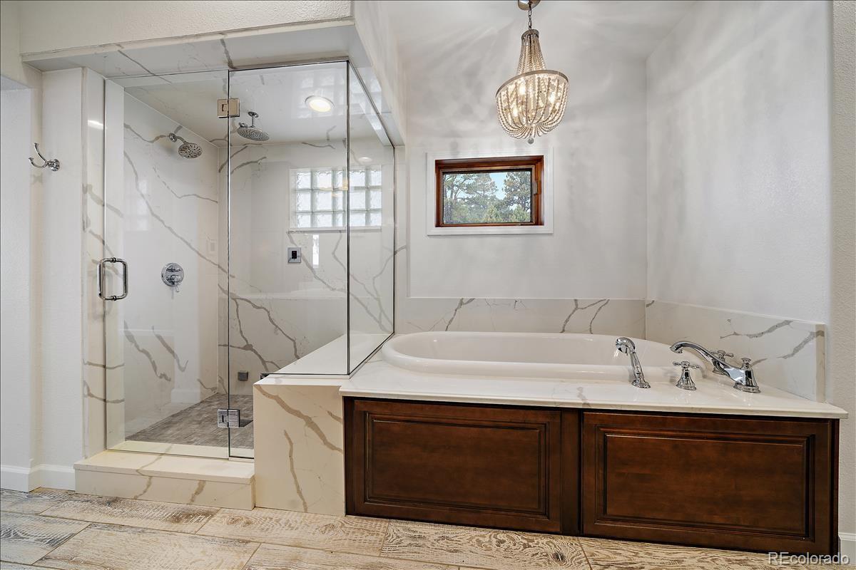 1305 South Grapevine Road Golden, CO 80401 - Photo 29 of 39 a bathroom with a sink and a mirror