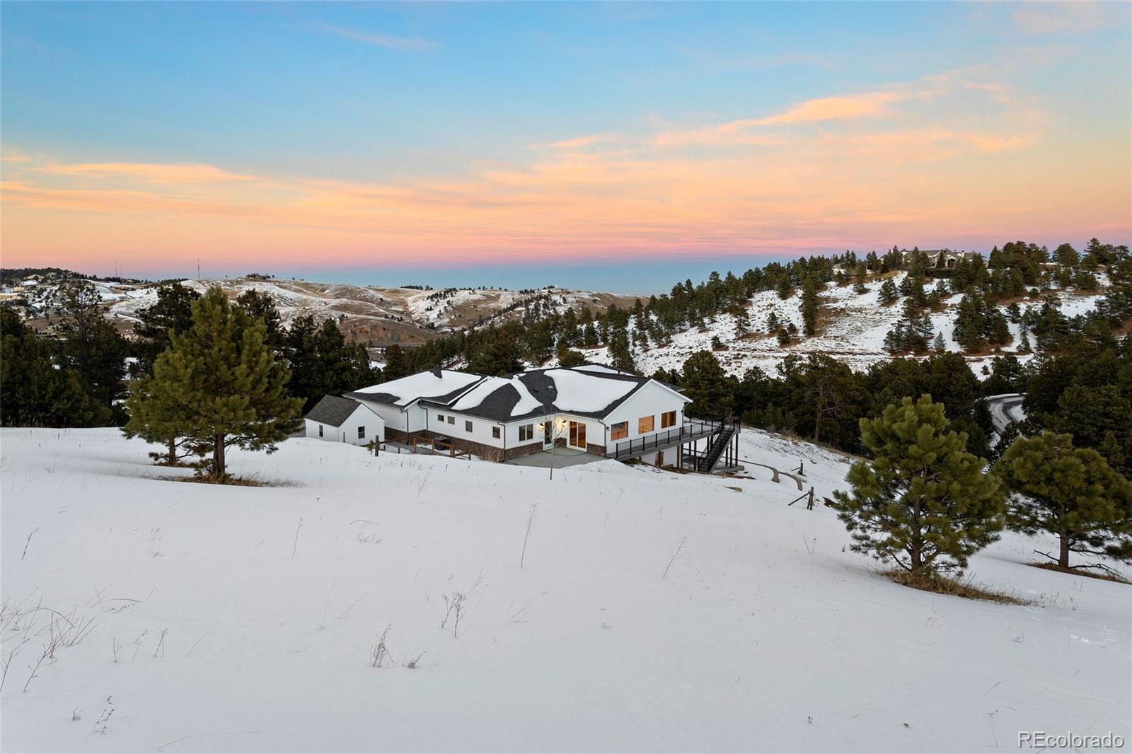 1305 South Grapevine Road Golden, CO 80401 - Photo 5 of 39 a view of a city street with with trees