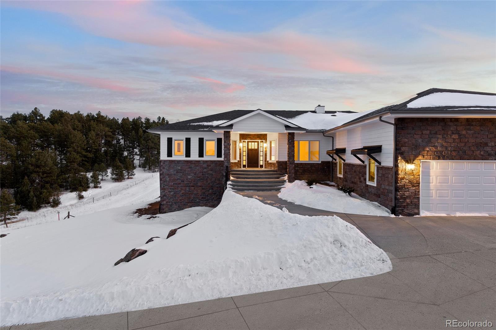 1305 South Grapevine Road Golden, CO 80401 - Photo 7 of 39 a view of residential houses with yard and car parked