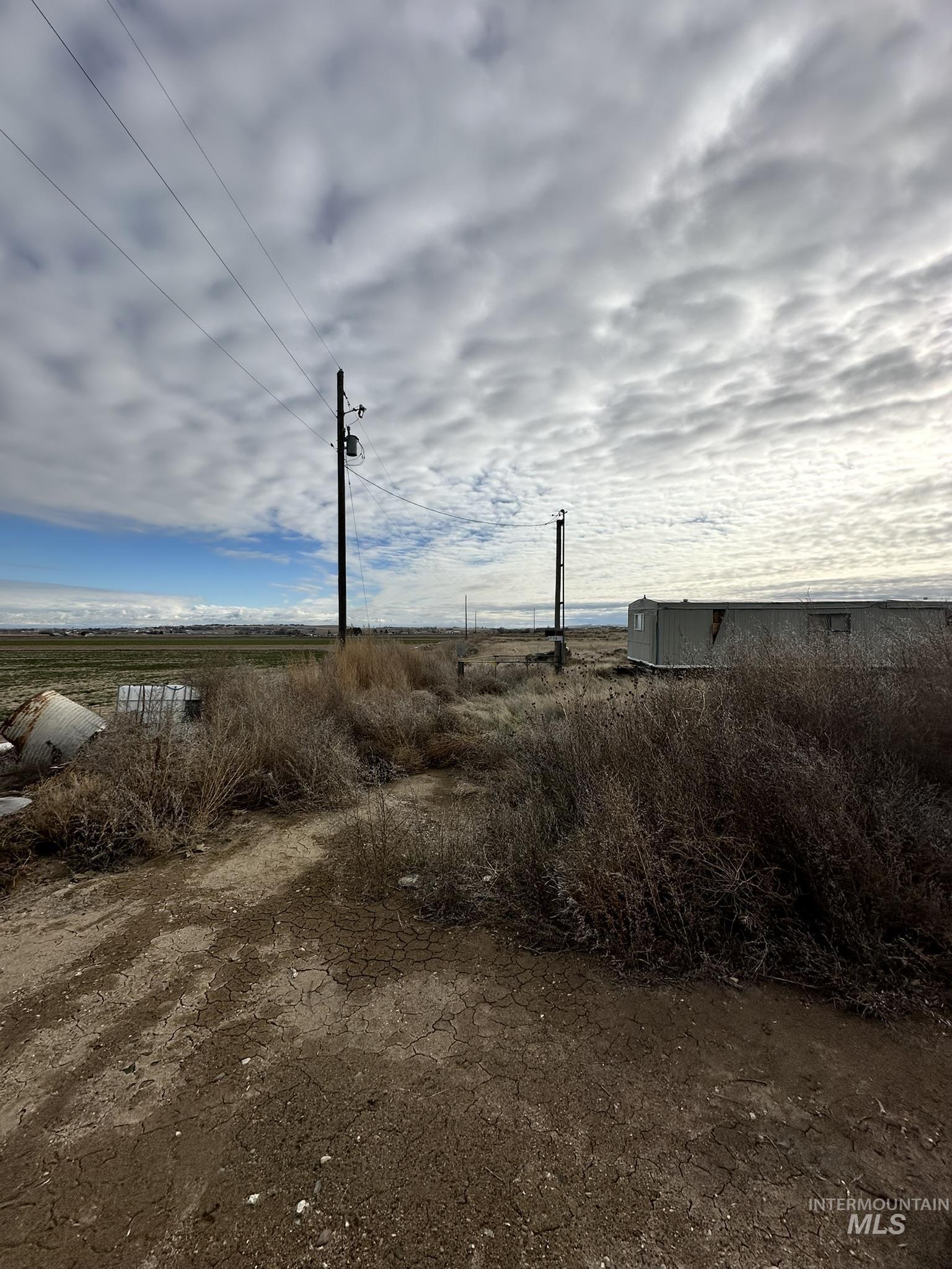 6750 Dearborne Road Nampa, ID 83686 - Photo 26 of 26 View of yard featuring a view of rural / pastoral area