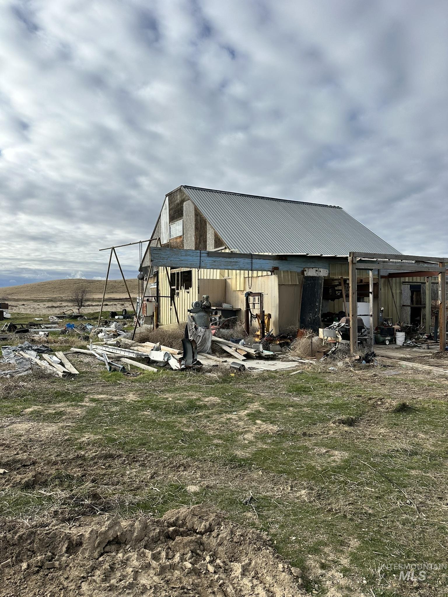 6750 Dearborne Road Nampa, ID 83686 - Photo 8 of 26 View of yard featuring an outdoor structure