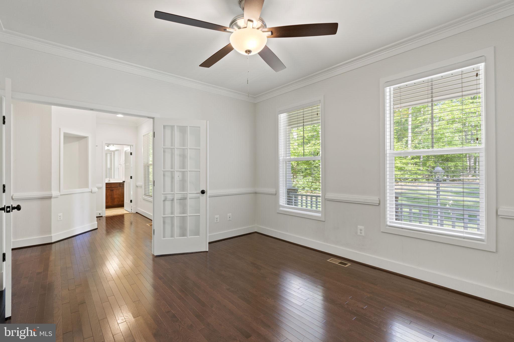 9171 Keyser Road Nokesville, VA 20181 - Photo 6 of 47 with French doors and ceiling fan.