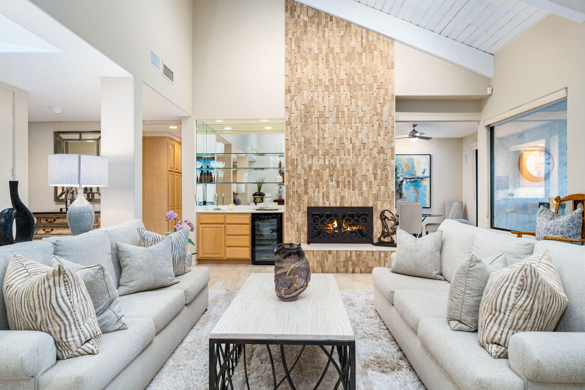 702 Inverness Drive Rancho Mirage, CA 92270 - Photo 15 of 49 a living room with furniture and a fireplace