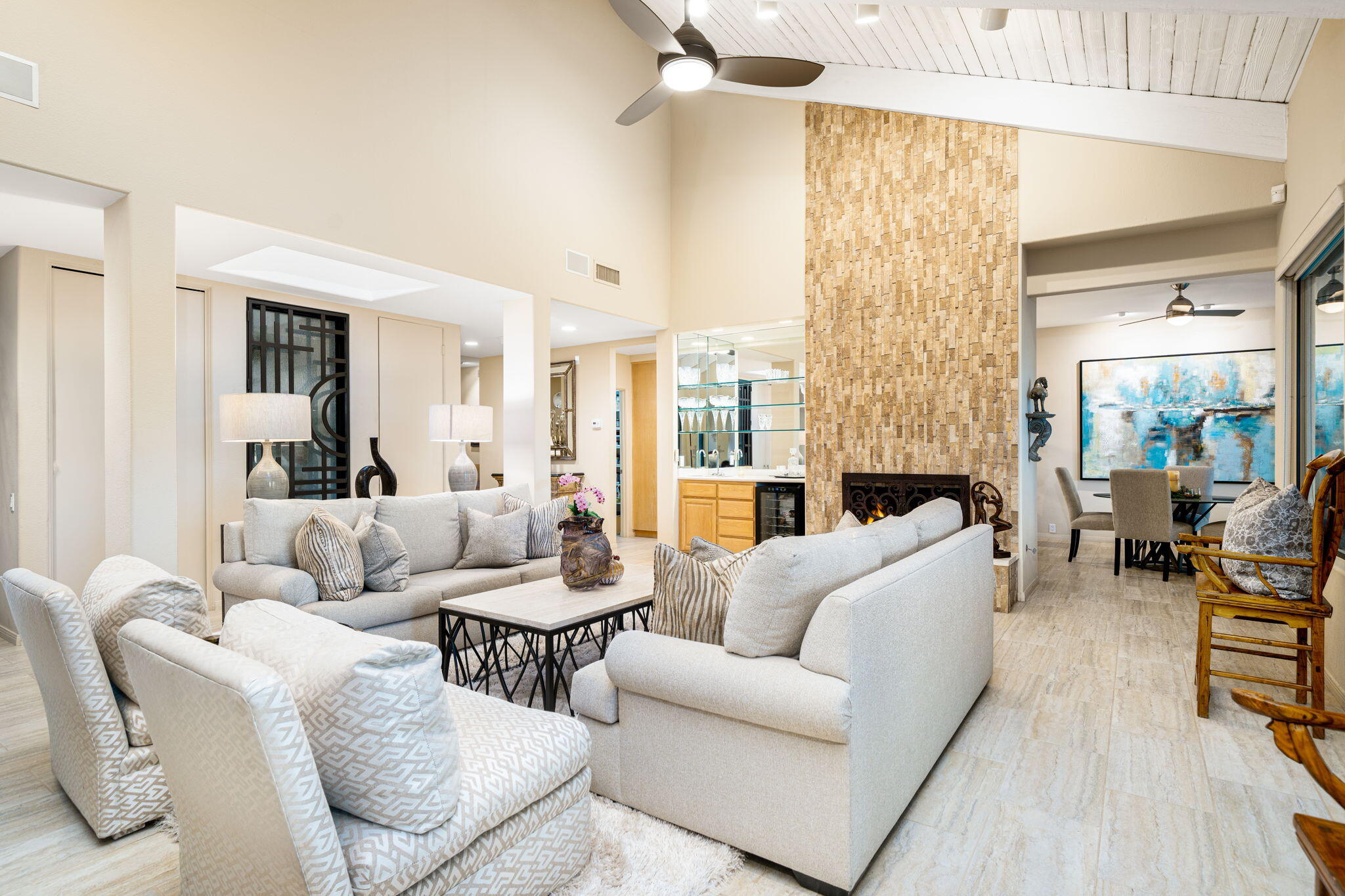 702 Inverness Drive Rancho Mirage, CA 92270 - Photo 16 of 49 a living room with furniture and a large window