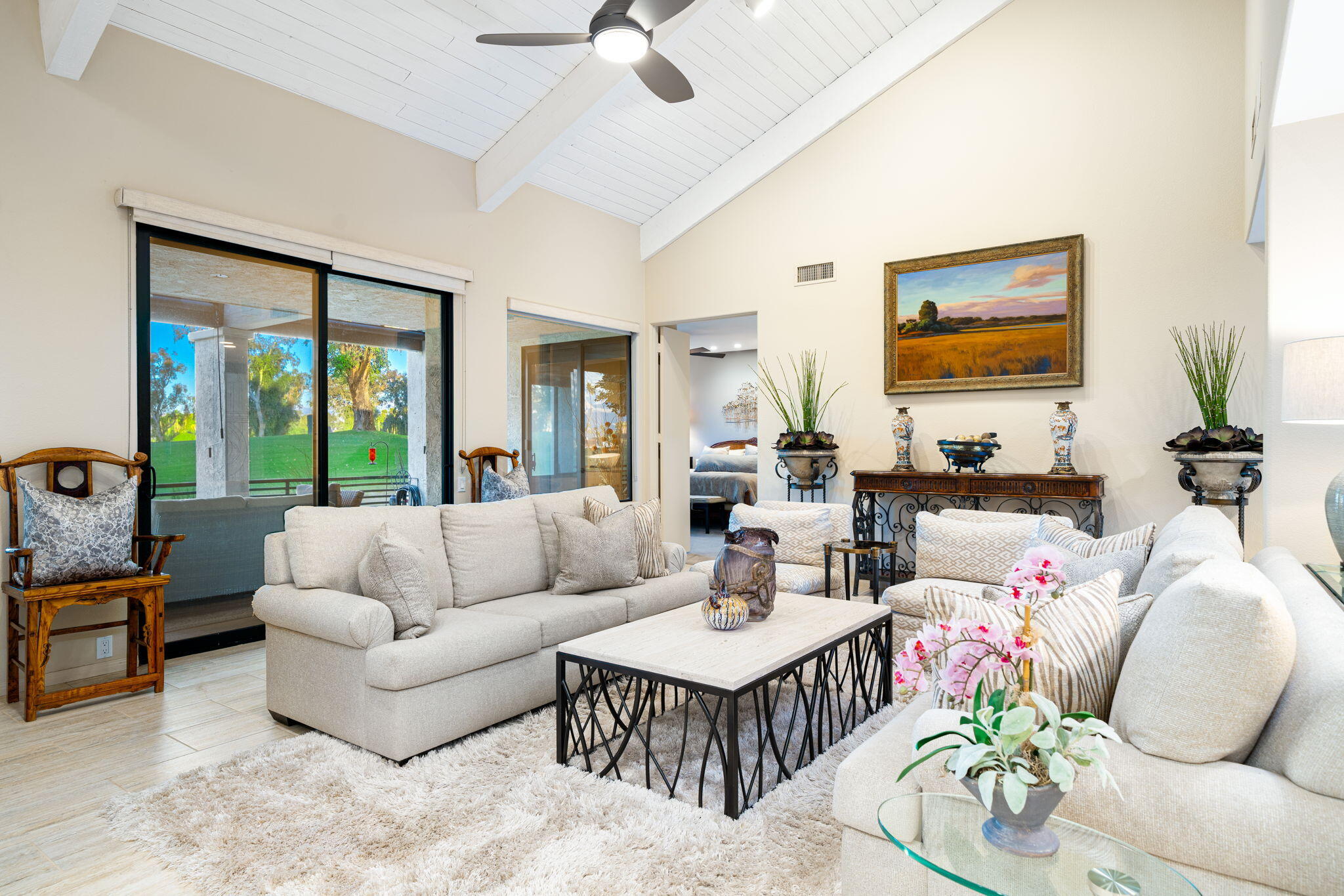 702 Inverness Drive Rancho Mirage, CA 92270 - Photo 17 of 49 a living room with furniture and a large window
