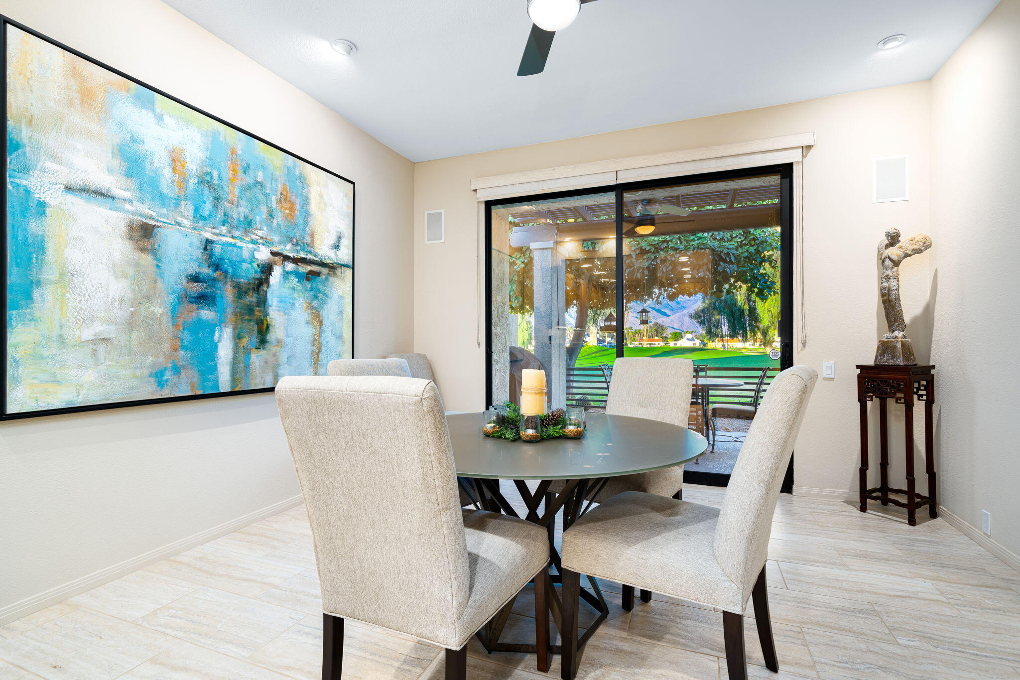 702 Inverness Drive Rancho Mirage, CA 92270 - Photo 19 of 49 a dining room with furniture window wooden floor