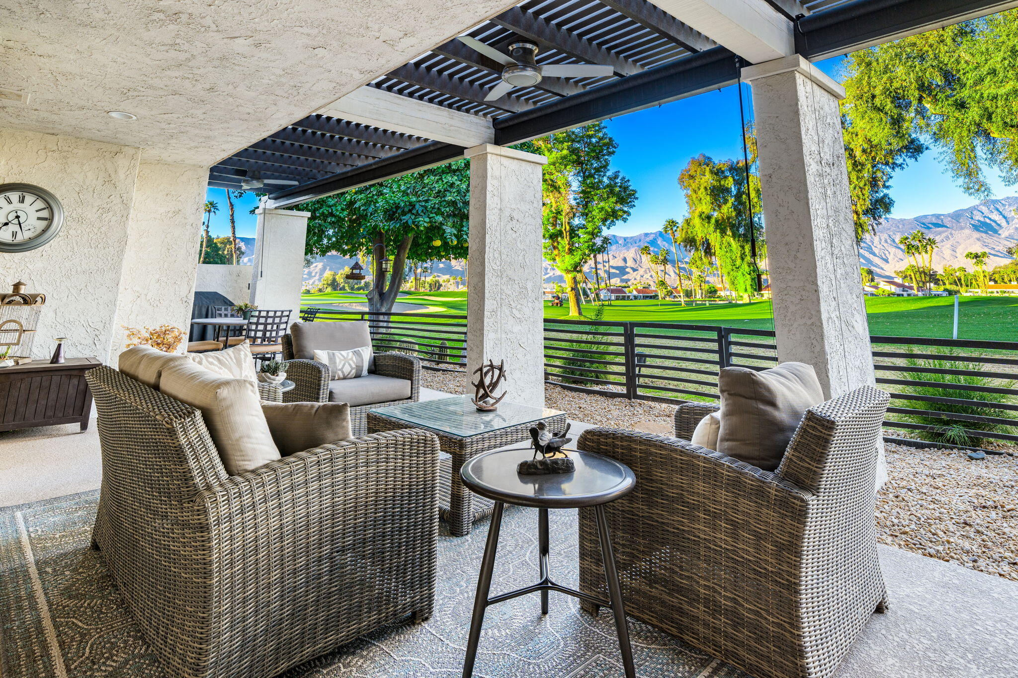 702 Inverness Drive Rancho Mirage, CA 92270 - Photo 26 of 49 a outdoor living space with furniture and garden view