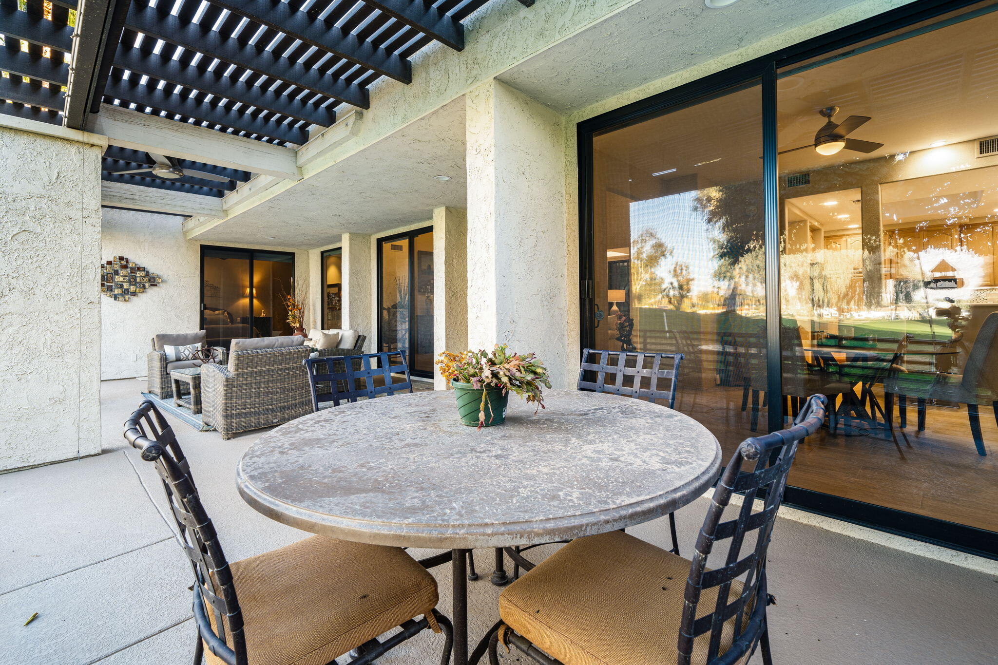 702 Inverness Drive Rancho Mirage, CA 92270 - Photo 29 of 49 a view of a dining room with furniture window and outside view