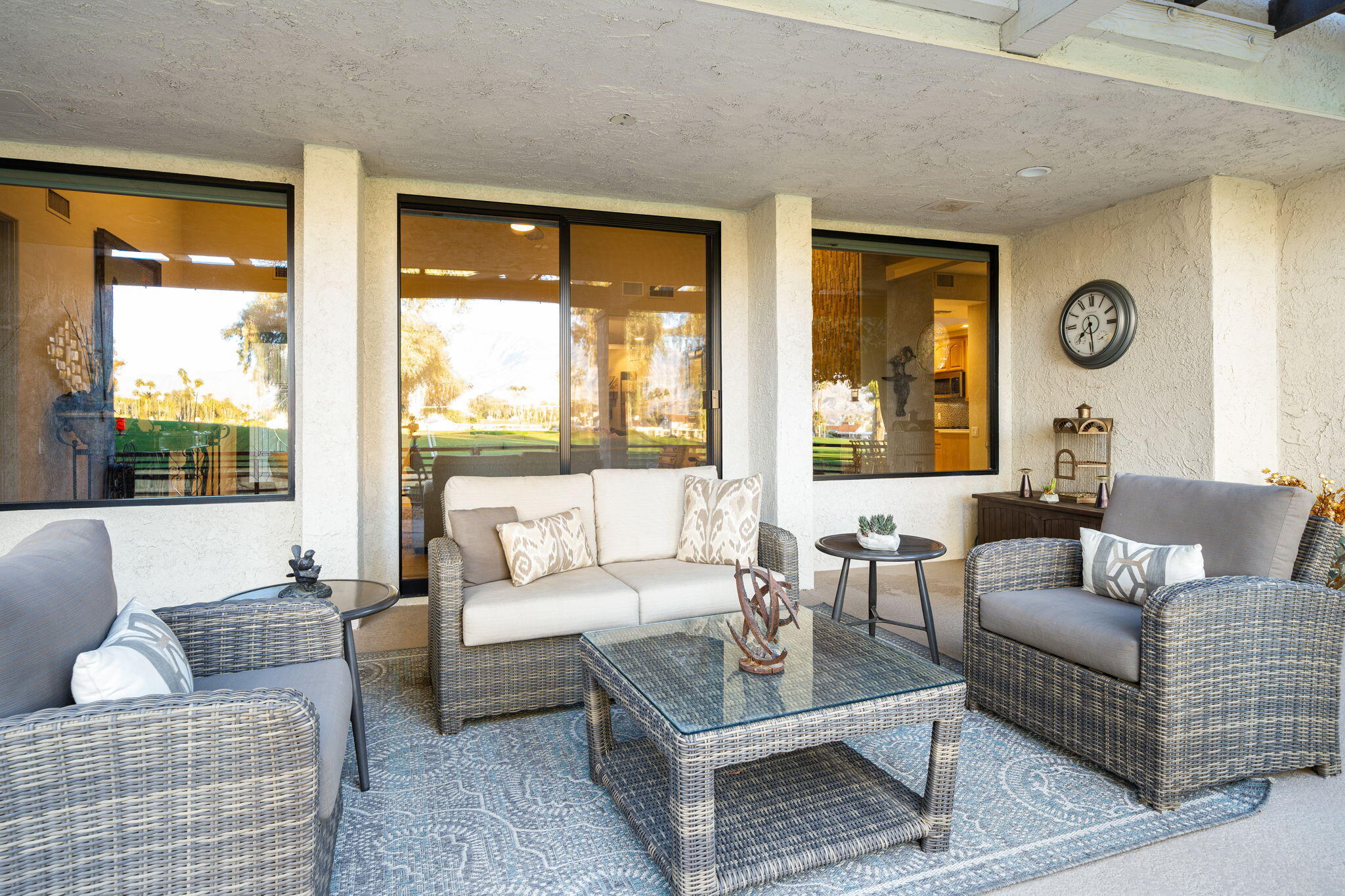 702 Inverness Drive Rancho Mirage, CA 92270 - Photo 30 of 49 a living room with furniture and a large window