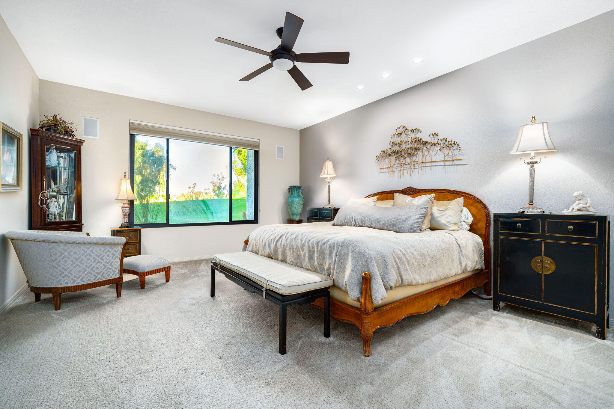 702 Inverness Drive Rancho Mirage, CA 92270 - Photo 31 of 49 a bedroom with a bed and a couch