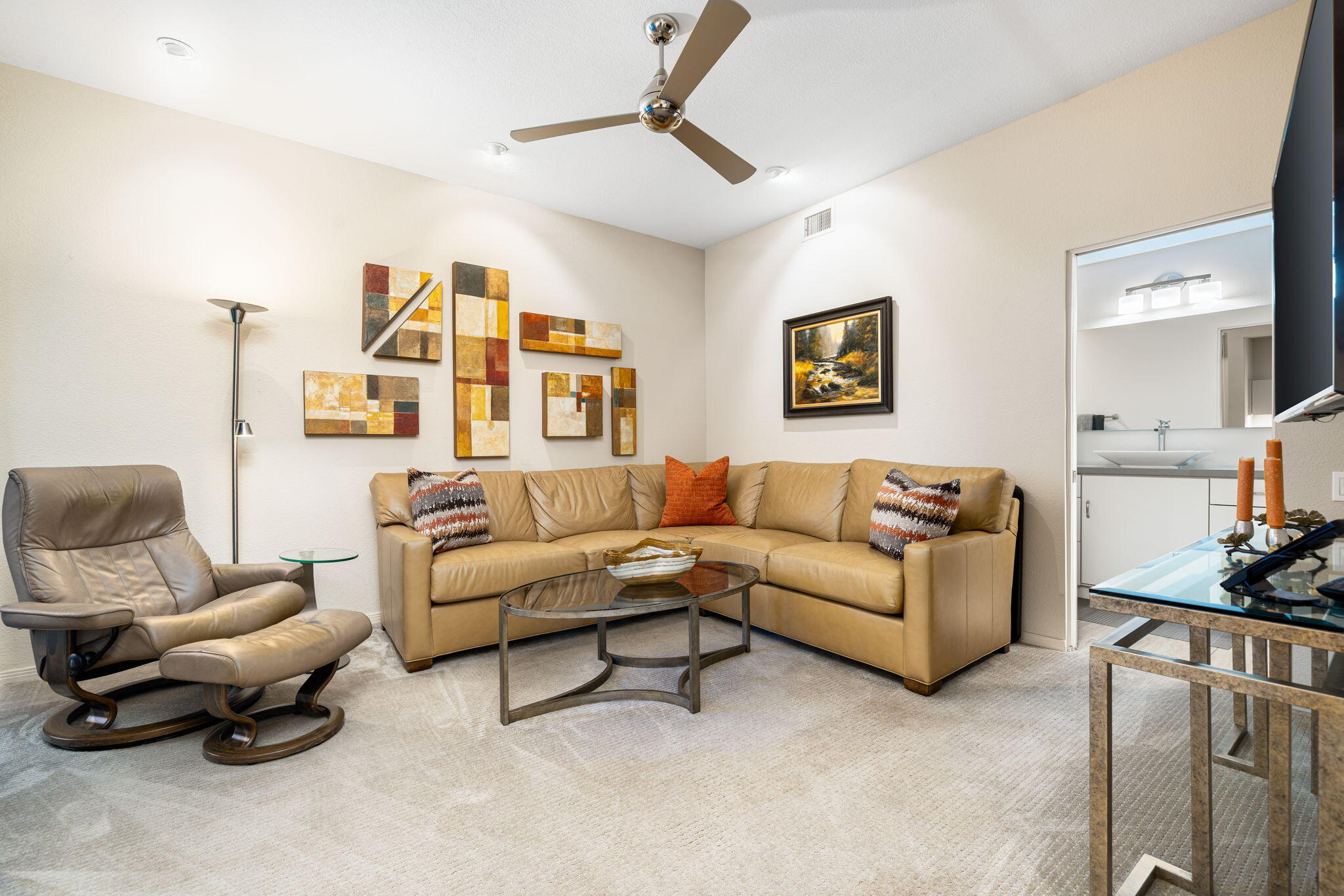 702 Inverness Drive Rancho Mirage, CA 92270 - Photo 41 of 49 a living room with furniture a rug and white walls