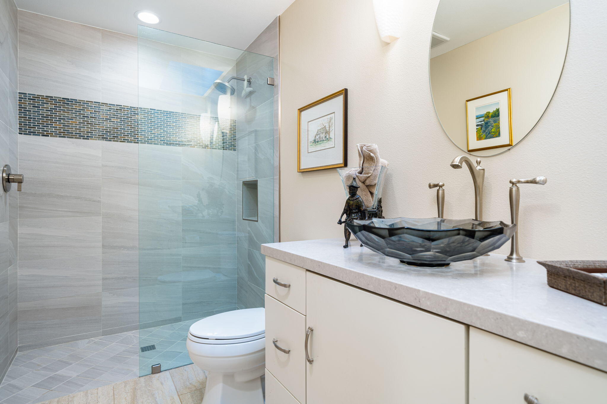 702 Inverness Drive Rancho Mirage, CA 92270 - Photo 44 of 49 a bathroom with a granite countertop sink a toilet and a mirror