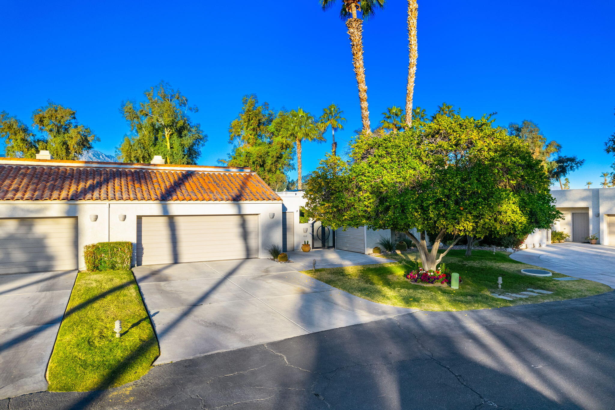 702 Inverness Drive Rancho Mirage, CA 92270 - Photo 5 of 49 a view of a swimming pool with a patio