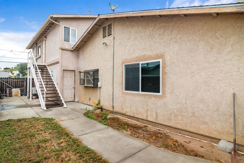 10121 Los Ranchitos Road Lakeside, CA 92040 - Photo 24 of 25 South side of house with steps to game room above garage.